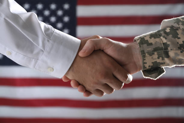 VA disability attorney shaking hands with veteran